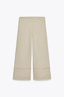 PANTALON RUSTIQUE EFFRANGÉ