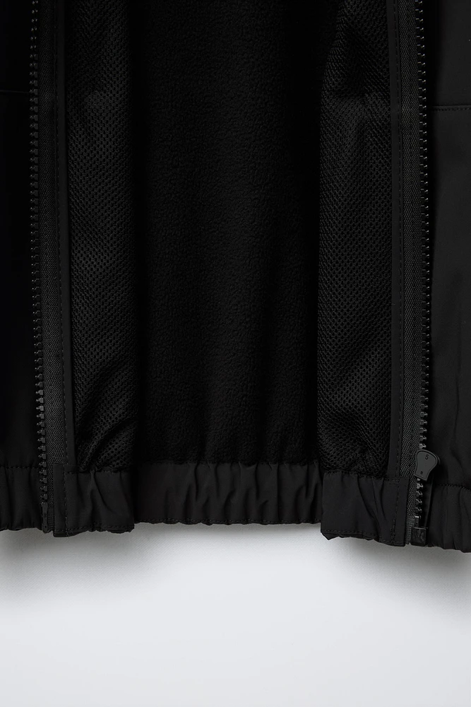 WATER REPELLENT TECHNICAL JACKET WITH HOOD