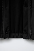 WATER REPELLENT TECHNICAL JACKET WITH HOOD