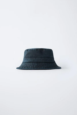 REVERSIBLE WAXED BUCKET HAT