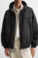 HOODED TECHNICAL JACKET