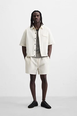 BERMUDA RELAXED FIT DÉLAVÉ