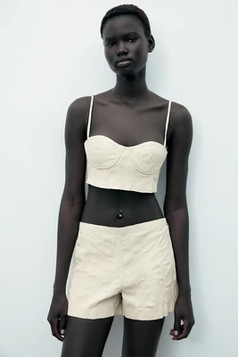 SHORT EN CUIR 100 % À EFFET PLISSÉ