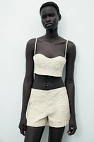SHORT EN CUIR 100 % À EFFET PLISSÉ