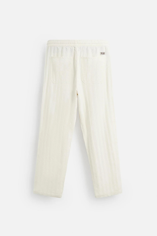 PANTALON JACQUARD RAYÉ