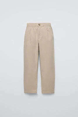 PLEATED TAPERED PANTS