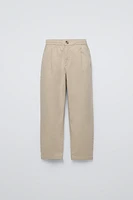 PLEATED TAPERED PANTS