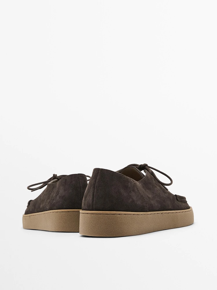 Chaussures en croûte de cuir avec ganse