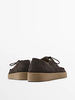 Chaussures en croûte de cuir avec ganse