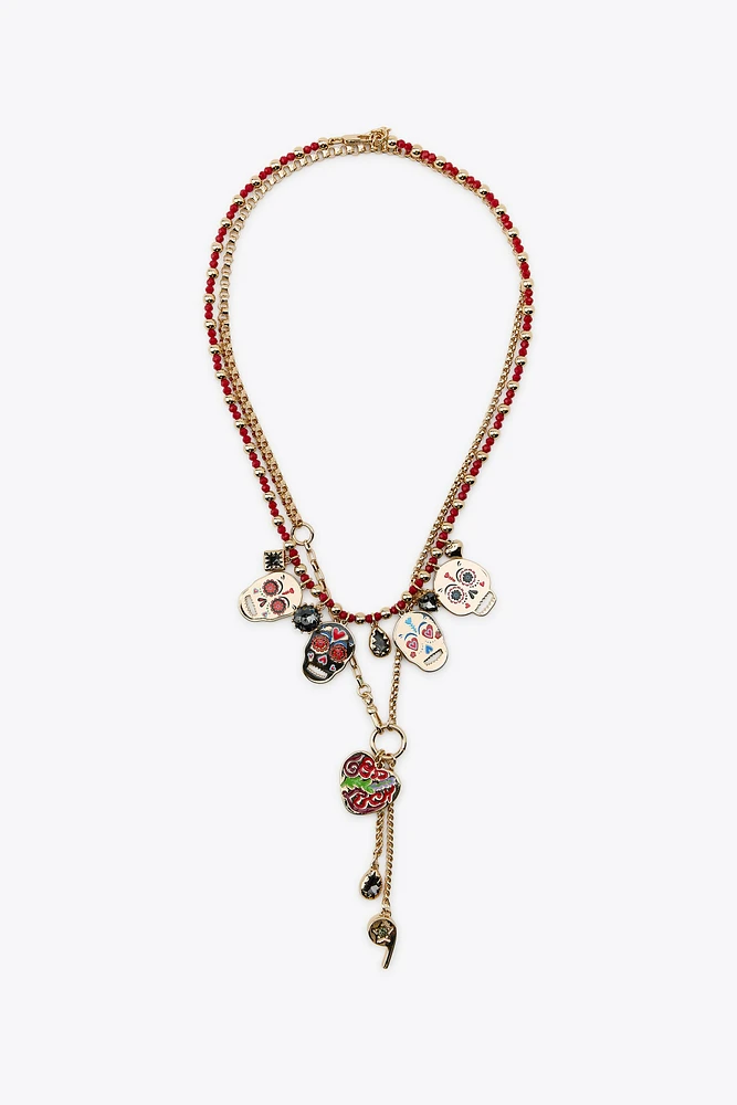 2-PACK OF ENAMELED SKULL NECKLACES