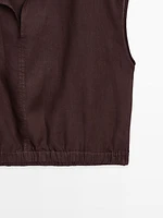 Linen blouse with elasticated hem