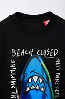 T-SHIRT FILM JAWS © 50E ANNIVERSAIRE