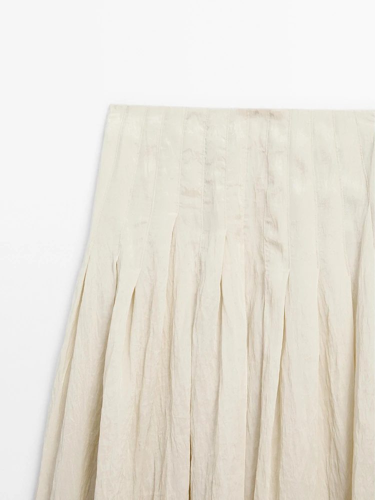 Flowing midi skirt with box pleats