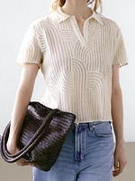 Polo en maille ajourée avec broderie