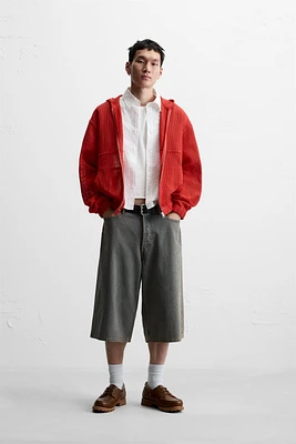VESTE STRUCTURE OUVERTE CAPUCHE