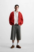 VESTE STRUCTURE OUVERTE CAPUCHE