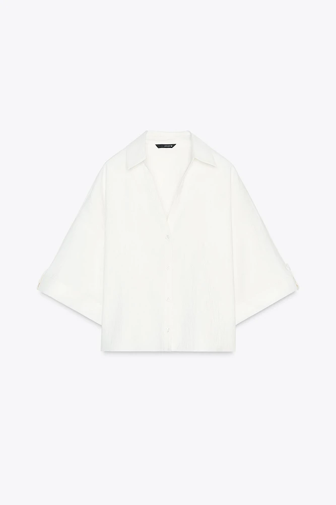 CHEMISE MANCHES COURTES LARGES