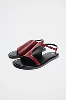 ASYMMETRIC FLAT LEATHER SANDALS