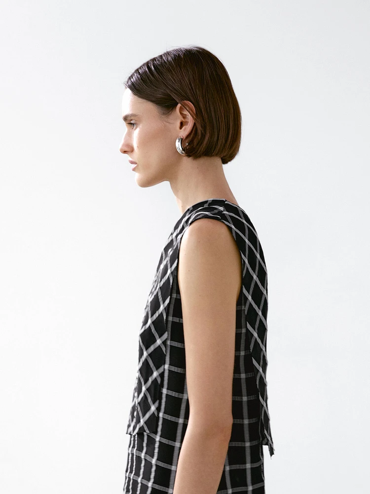 Checked top with asymmetric neckline