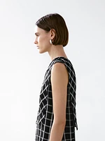 Checked top with asymmetric neckline