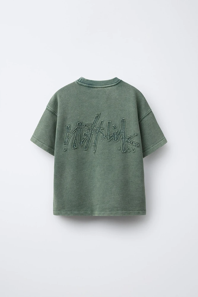 T-SHIRT EFFET DÉLAVÉ GRAFFITI