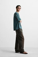 T-SHIRT EN MAILLE IMPRIMÉ DÉLAV