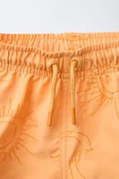 6-14 ANS/ SHORT DE BAIN SOLEILS BRODÉS