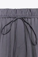 FLOWY PAPERBAG BELTED PANTS