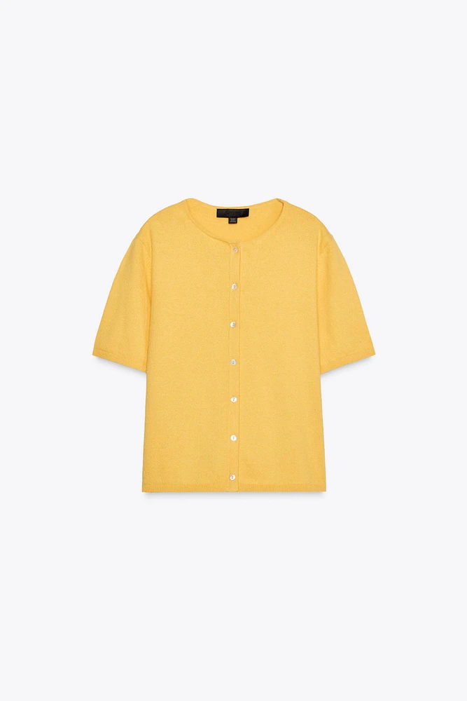 VESTE EN MAILLE UNIE