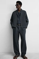 PANTALON COUPE REGULAR À PLIS