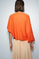 TOP CAPE EN MAILLE UNIE