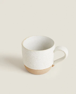 MUG WITH RAISED DESIGN