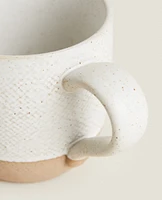 MUG WITH RAISED DESIGN