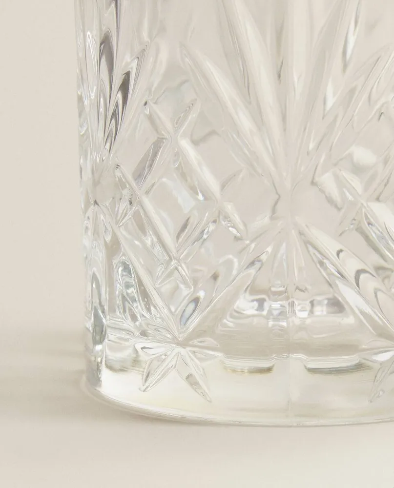 CRYSTALLINE TUMBLER WITH RAISED DESIGN