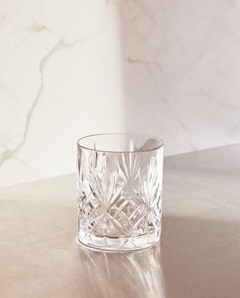 CRYSTALLINE TUMBLER WITH RAISED DESIGN