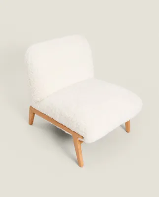 UPHOLSTERED FAUX FUR ARMCHAIR
