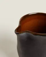 STONEWARE JUG WITH HANDLE