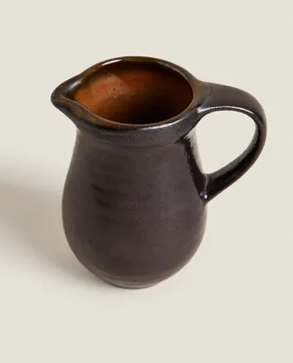 STONEWARE JUG WITH HANDLE