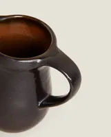 STONEWARE JUG WITH HANDLE