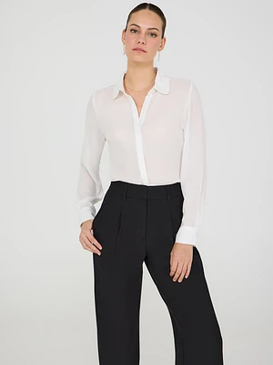 Blouse boutonnée sur le devant avec passepoil contrasté