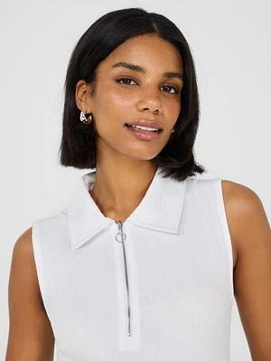 Polo sans manches à demi-zip