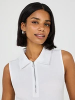 Polo sans manches à demi-zip