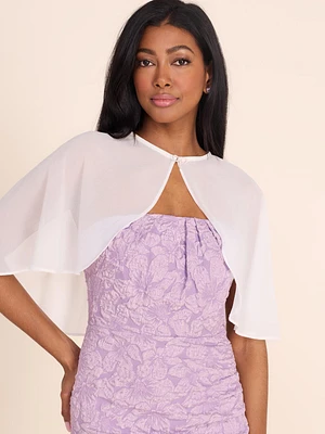 BolÃ©ro en mousseline avec cape et boucle