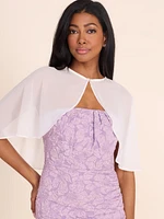 BolÃ©ro en mousseline avec cape et boucle