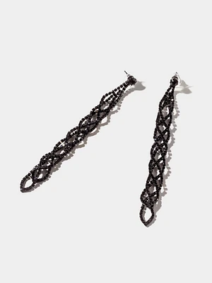 Boucles d'oreilles tressées ornées de bijoux