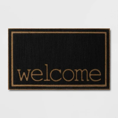 16x26 Welcome Embossed Doormat Black - Threshold