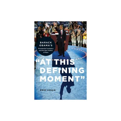 At This Defining Moment - by Enid Lynette Logan (Hardcover)