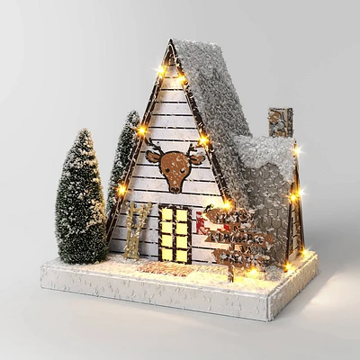 Lit Paper Ski Lodge with Bottle Brush Trees Christmas Figurine - Wondershop White