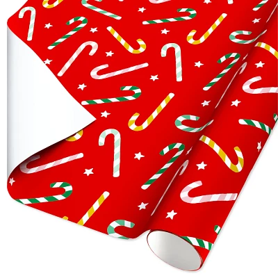 Colorful Candy Canes on Red Christmas Roll Wrap