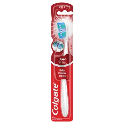 Toothbrush with tongue cleaner